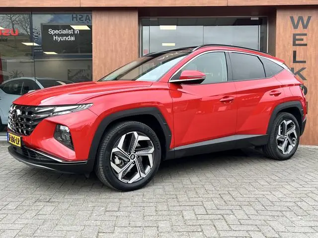 Hyundai Tucson 1.6 T-GDI HEV Comfort Plus Sky | Schuif/Kanteldak | Trekhaak | Add. Cruise control