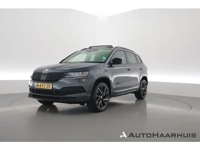ŠKODA Karoq 1.5 TSI ACT Sportline Business | Dig. Cockpit | Pano | Elek. Trekhaak | Canton Audio | A...