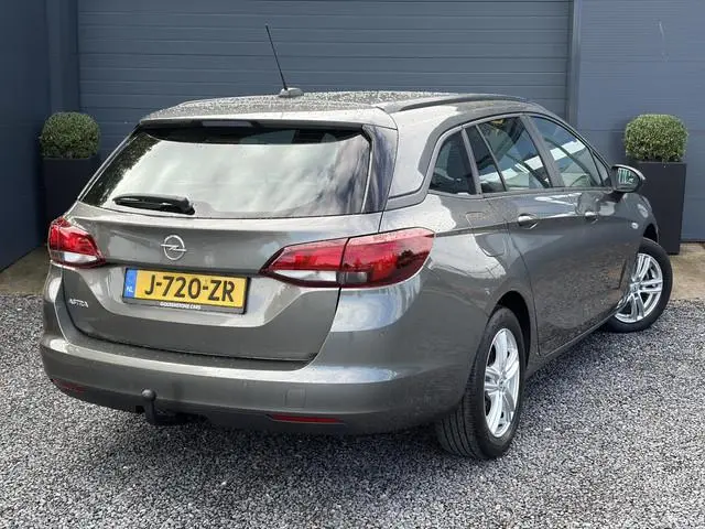 Opel Astra 1.2 Business Edition 147pk l 2e Eigenaar l Trekhaak l Navi l Carplay l 6 Bak l Clima l Cr...