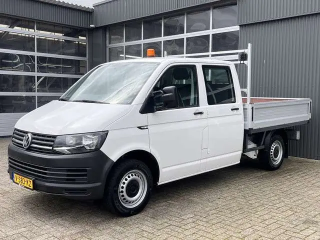 Volkswagen Transporter 2.0 TDI L2H1 DC 102pk Pick-up Trekhaak Airco Camera Cruise controle Navigatie Dubbele cabine Euro 6 Dealer onderhouden 1e Eigenaar Open laadbak Pick-up p-up Bakwagen