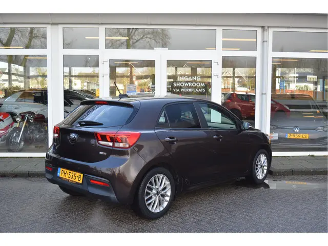 Kia Rio 1.0 100PK TGDI DynamicLine ✅ Carplay ✅ Camera ✅ Cruise ✅ Orig. NL ✅ NAP ✅