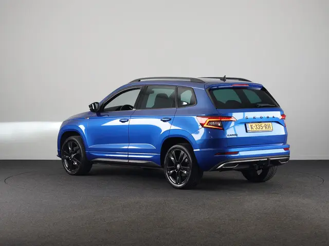 Skoda Karoq 1.5 TSI ACT Sportline Business 150pk | Wegklapbare trekhaak | Navigatie | Parkeercamera...