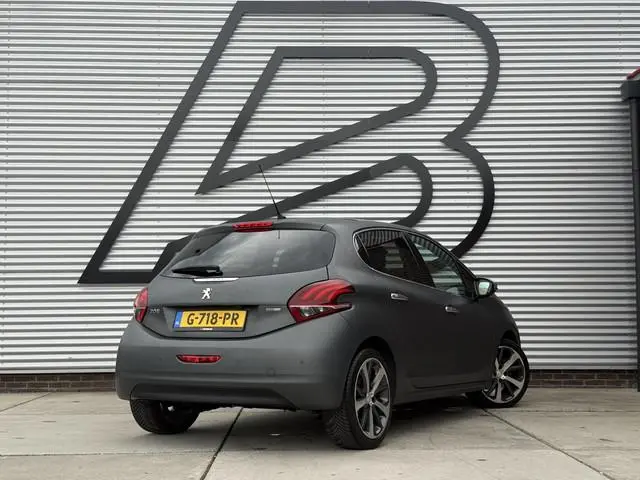Peugeot 208 1.2 PureTech Roland Garros 2e Eigenaar|Navi|Camera|Pano|D-riem vv in 2025|Clima|Cruise|C...