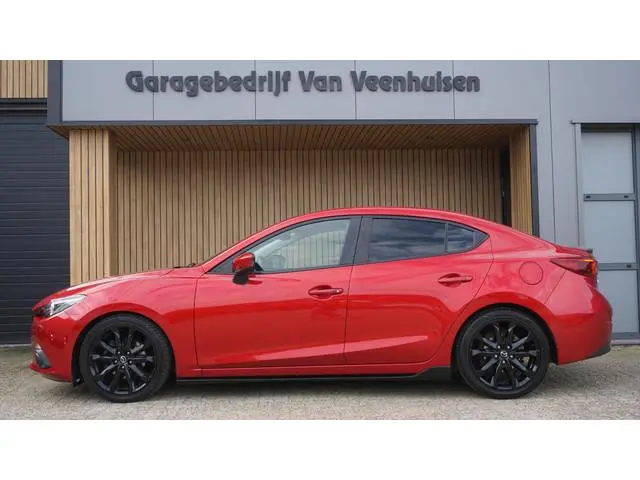 Mazda 3 2.0 120pk GT-M *Black Optik* Leder HUD BOSE LED Stoelverwarming Keyless *Soul Red Pearl* NL...