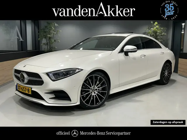 Mercedes-Benz CLS-klasse 450 4Matic AMG // Burmester // 360 Camera // Sunroof // Trekhaak // 20 inch // Designo White // Distronic
