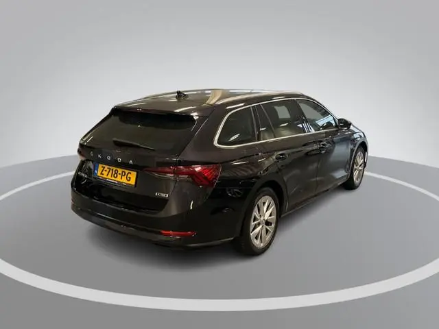 Skoda Octavia Combi 1.0 e-TSI 110pk DSG Business Edition · Inklap. Trekhaak · Keyless · Elek. Achter...