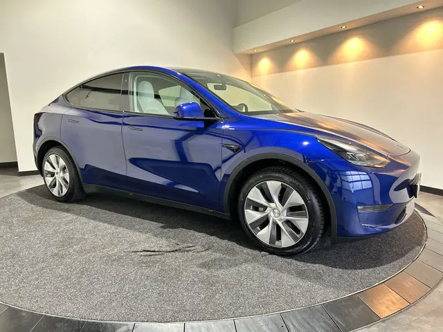 Tesla Model Y Long Range AWD 75 kWh Panoramadak | Wit leder! Soh (batterijcheck) Waarde 91.9%