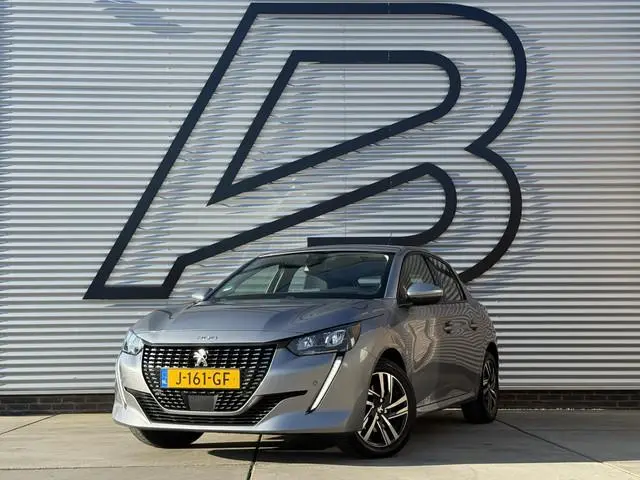 Peugeot 208 1.2 PureTech Allure 2e Eigenaar|Adap-cruise|Clima|Camera|Trekhaak|Carplay|PDC V+A|D-riem...