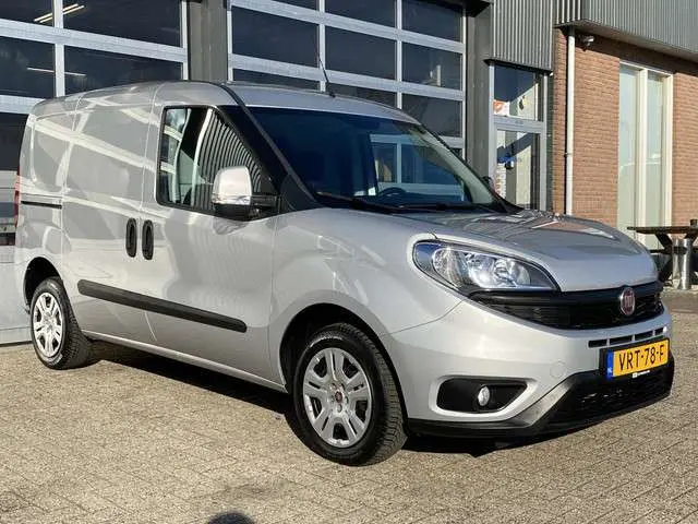 Fiat Doblò Cargo 1.3 MJ L1H1 SX 90pk Btw en Bpm vrij Airco Cruise controle Navigatie Tussenschot Parkeerhulp achter 1e eigenaar Ex overheid Euro 5 Marge