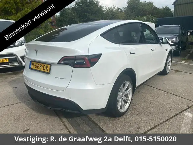 Tesla Model Y Long Range AWD 75 kWh | Navigatie | Panoramadak | 1e eigenaar | Lichtmetalen velgen |