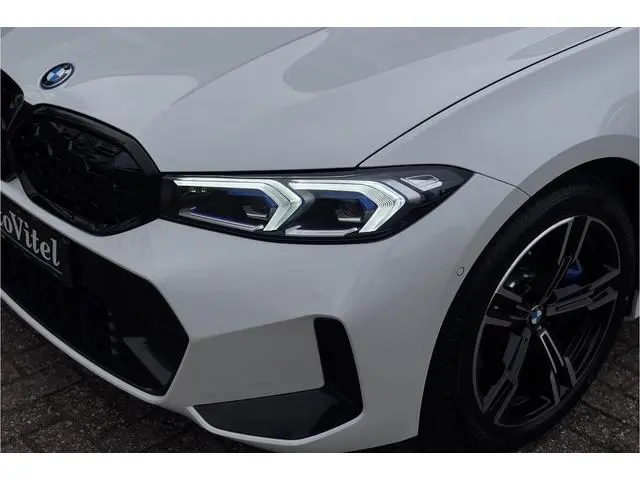 BMW 3-serie Touring 330e M-Sport | 19,5 kWh Accu | Panodak | Head-Up | Memory | Trekhaak | 360° Came...