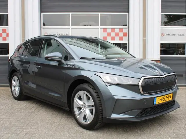 ŠKODA Enyaq iV 60 SOH 91,2%/1e EIG./Trekh./Stoelverw./Carplay/Navi/Cruise/Leer/PDC/Standkachel