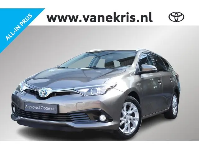 Toyota Auris 1.8 Hybrid Dynamic, Trekhaak, LM velgen, Cruise control, Privacy glass.