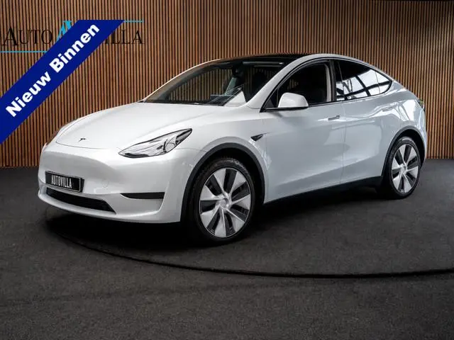 Tesla Model Y Long Range Dual - Motor AWD 351 pk Navi Camera Leer Warmtepomp ACC Autopilot PDC Elekt...