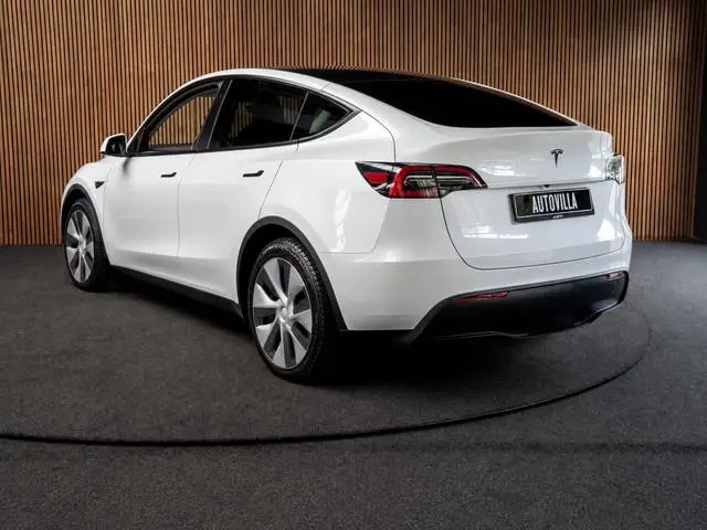 Tesla Model Y Long Range Dual - Motor AWD 351 pk Navi Camera Leer Warmtepomp ACC Autopilot PDC Elekt...
