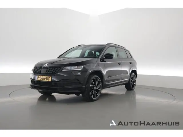 ŠKODA Karoq 1.5 TSI ACT Sportline Business | Digi. Dashboard | Elek. Trekhaak | Adapt. Cruise | Came...