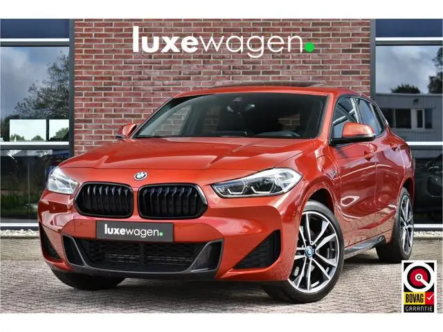 BMW X2 xDrive25e M-Sport | Pano | HUD | Sunset orange | 19 inch | Camera