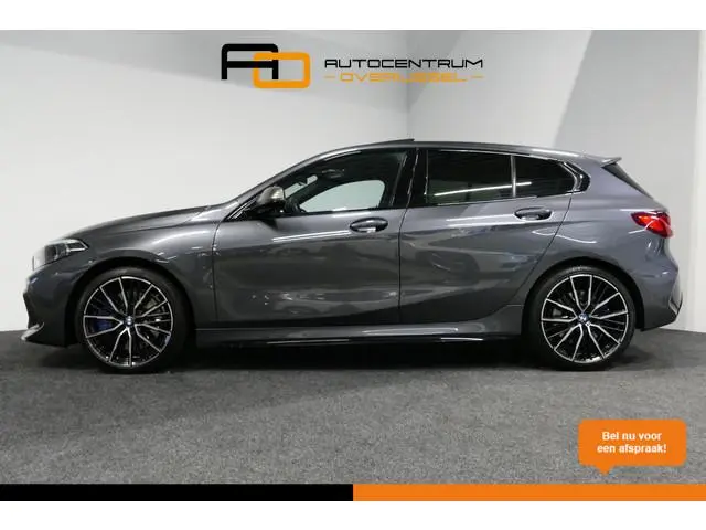 BMW 1-serie M135i xDrive High Executive Edition / Orig. Nederlands / Panoramadak / Stoelverwarming /...