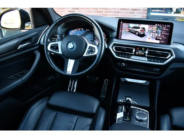 BMW X3 xDrive30e M-Sport Pano Trekh HUD E-zetels 360-cam Gesture