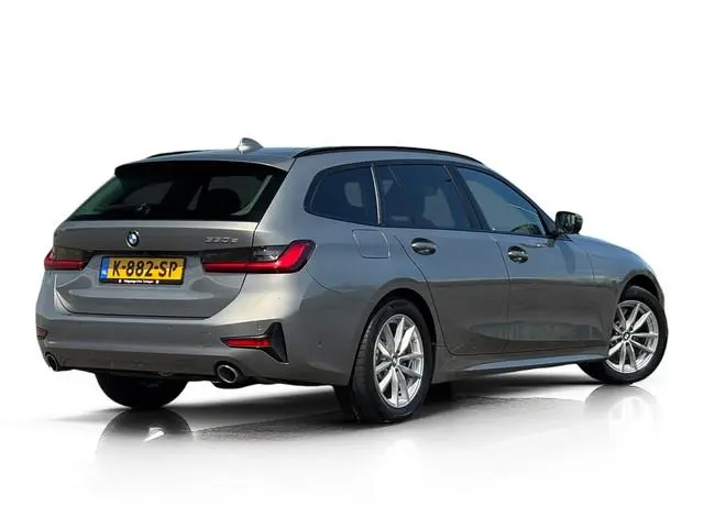 BMW 3-serie Touring 330e High Executive ✅ Leder ✅ ACC ✅ Camera