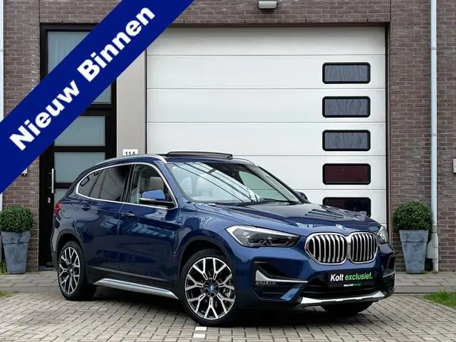 BMW X1 xDrive25e High Executive 220 PK Plug in Hybride | Panoramdak | Navigatie | 19" Velgen | Leder...