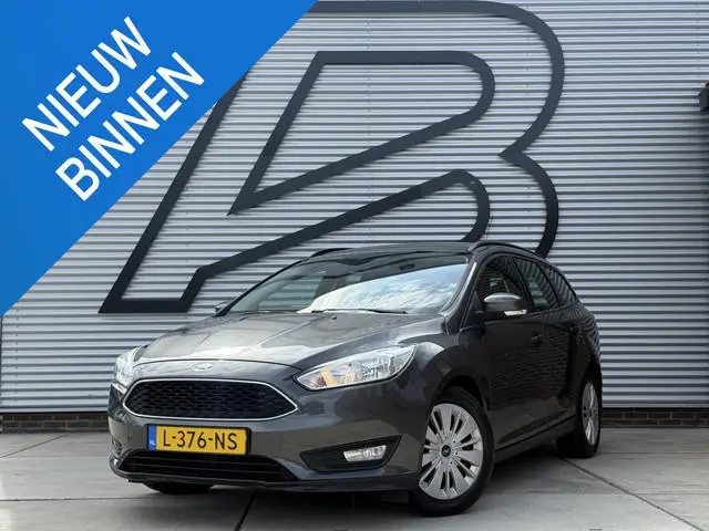 Ford Focus Wagon 1.0 Titanium 1e Eigenaar|Navi|Trekhaak|Carplay|Cruise|Airco|PDC|Stoelverwarming|APK...