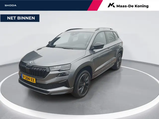 Skoda Karoq 1.5 TSI 150pk DSG ACT Sportline Business · Panoramadak · Trekhaak · Camera · Keyless · A...