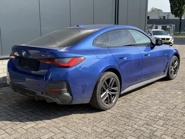 BMW i4 eDrive40 High Executive 84 kWh M Sport 18"/SOH 100%/Lederen M-stoelen + memory/Head-up/Adapti...