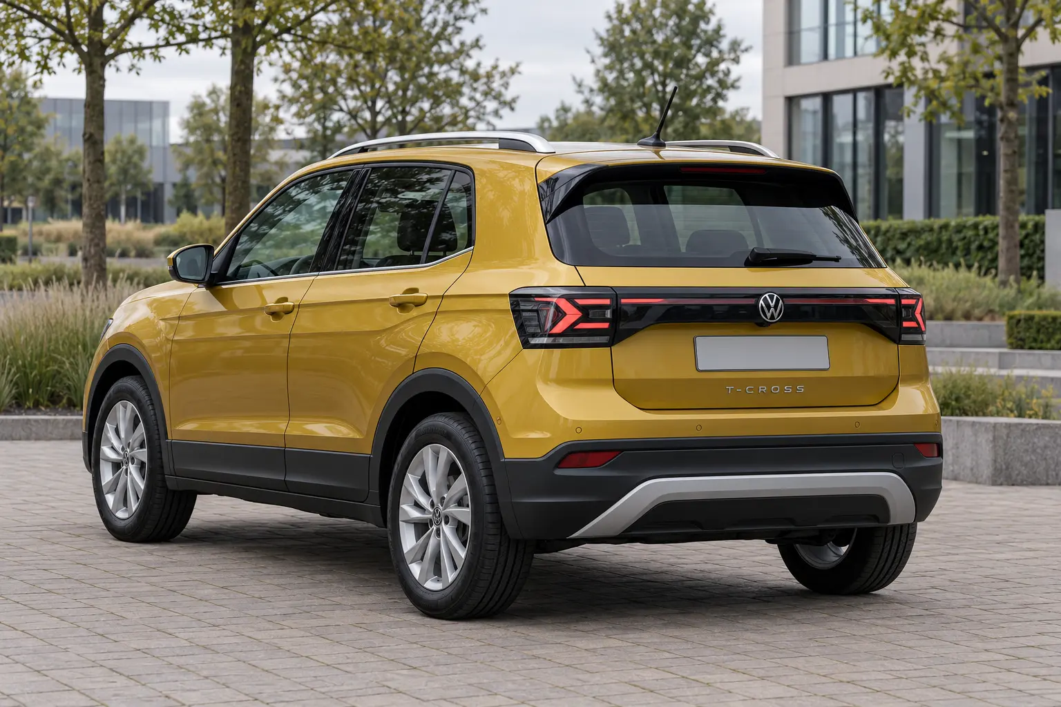Gele vernieuwde Volkswagen T-Cross van achteren